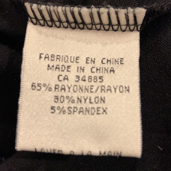 Black pencil skirt with button decoration at waist. Back zip. Mint condition - Picture 5 of 5